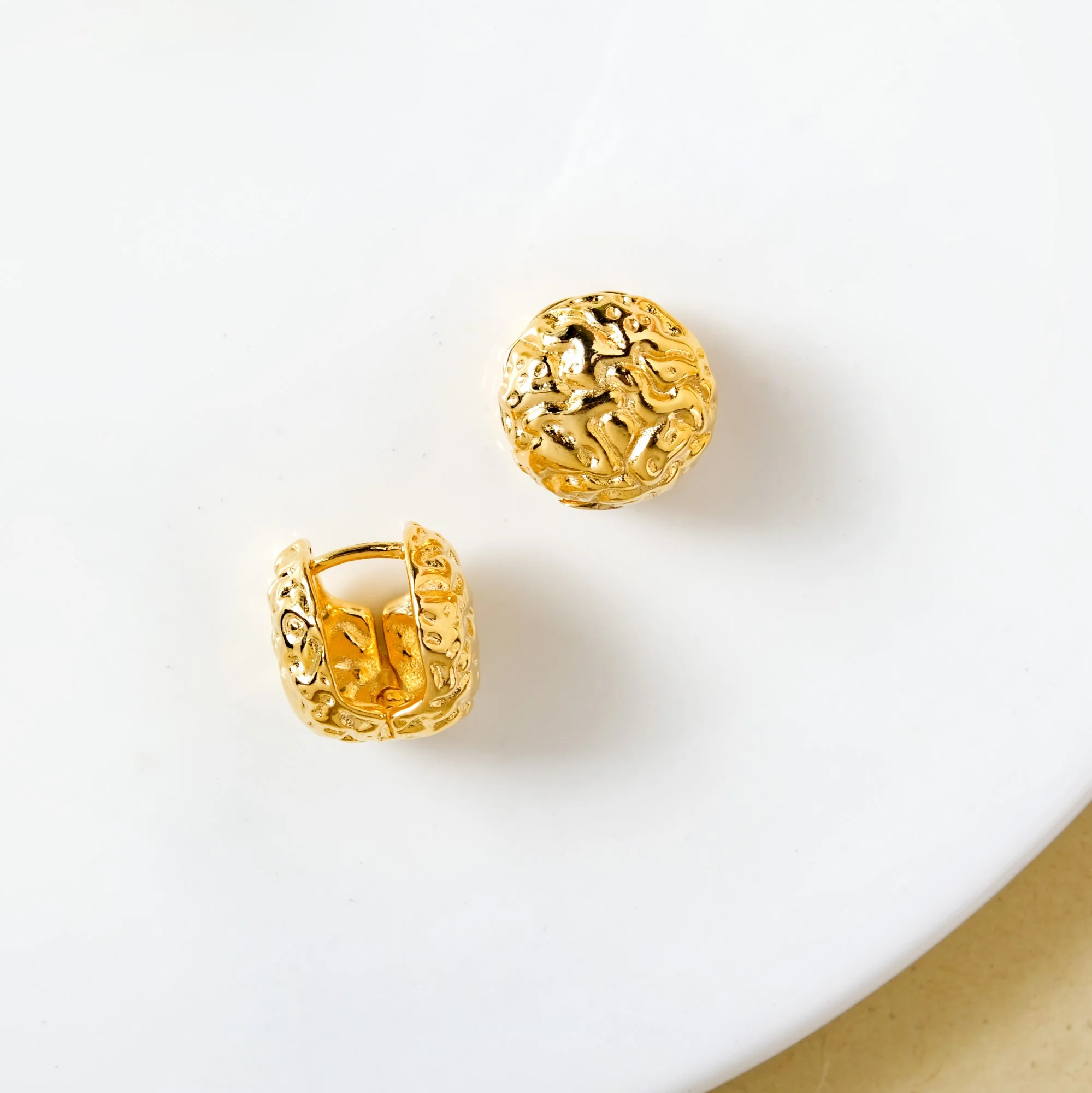 Hammered Metal Gold Huggie Earrings - Image 3