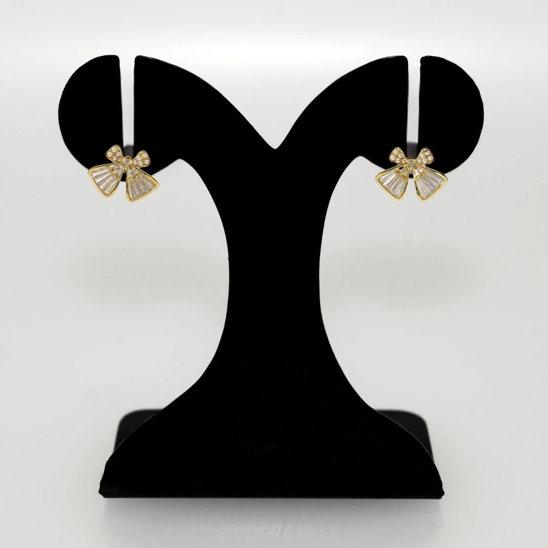 Iridescent Pearl Bow Stud Earrings - Image 6