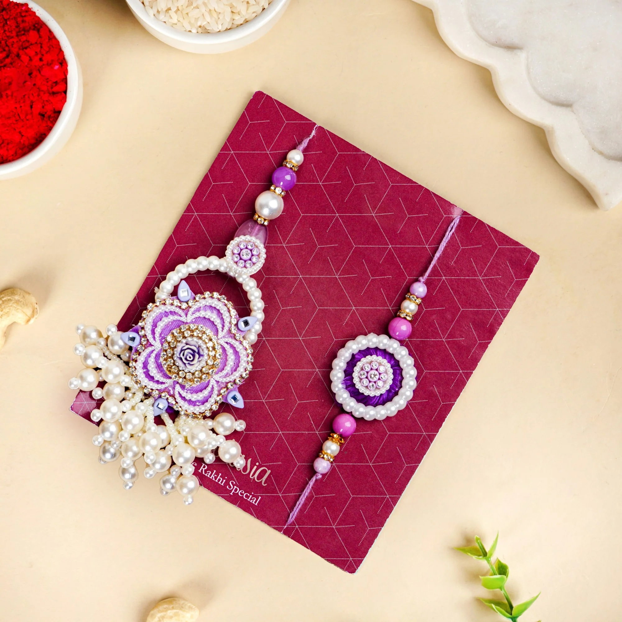 Purple Pearl Beaded Rakhi With Floral Lumba For Couples - Image 5
