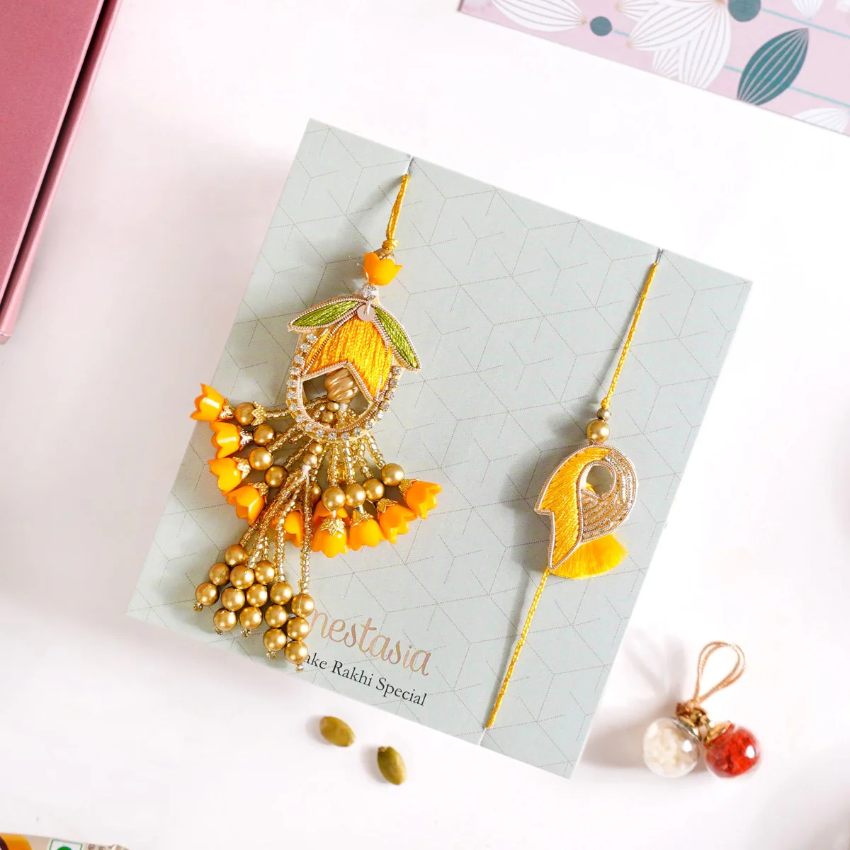 Set Of 4 Couple Yellow Rakhi And Lumba Gift Box